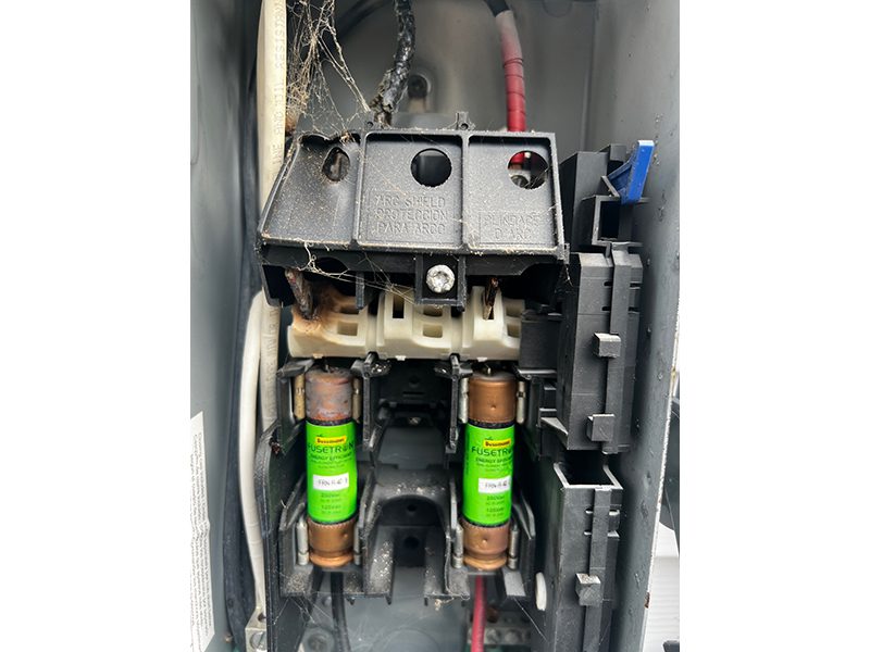 Here is a look at my solar panel breaker box with the cover off. A surge fried the breaker box taking my solar system offline. 
