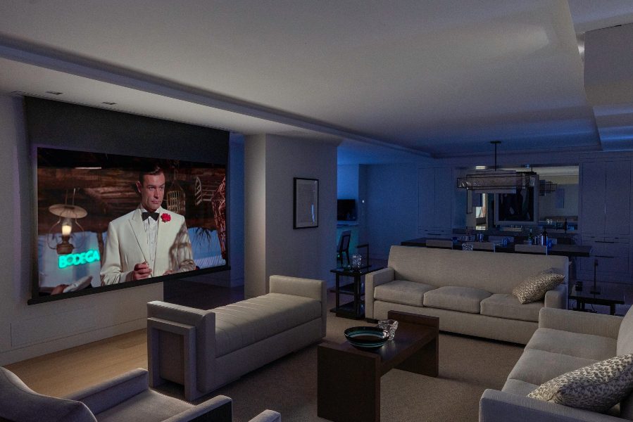 Manhattan media room at night, James Bond on a projector screen, Sound & VIsion Advanced Technologies